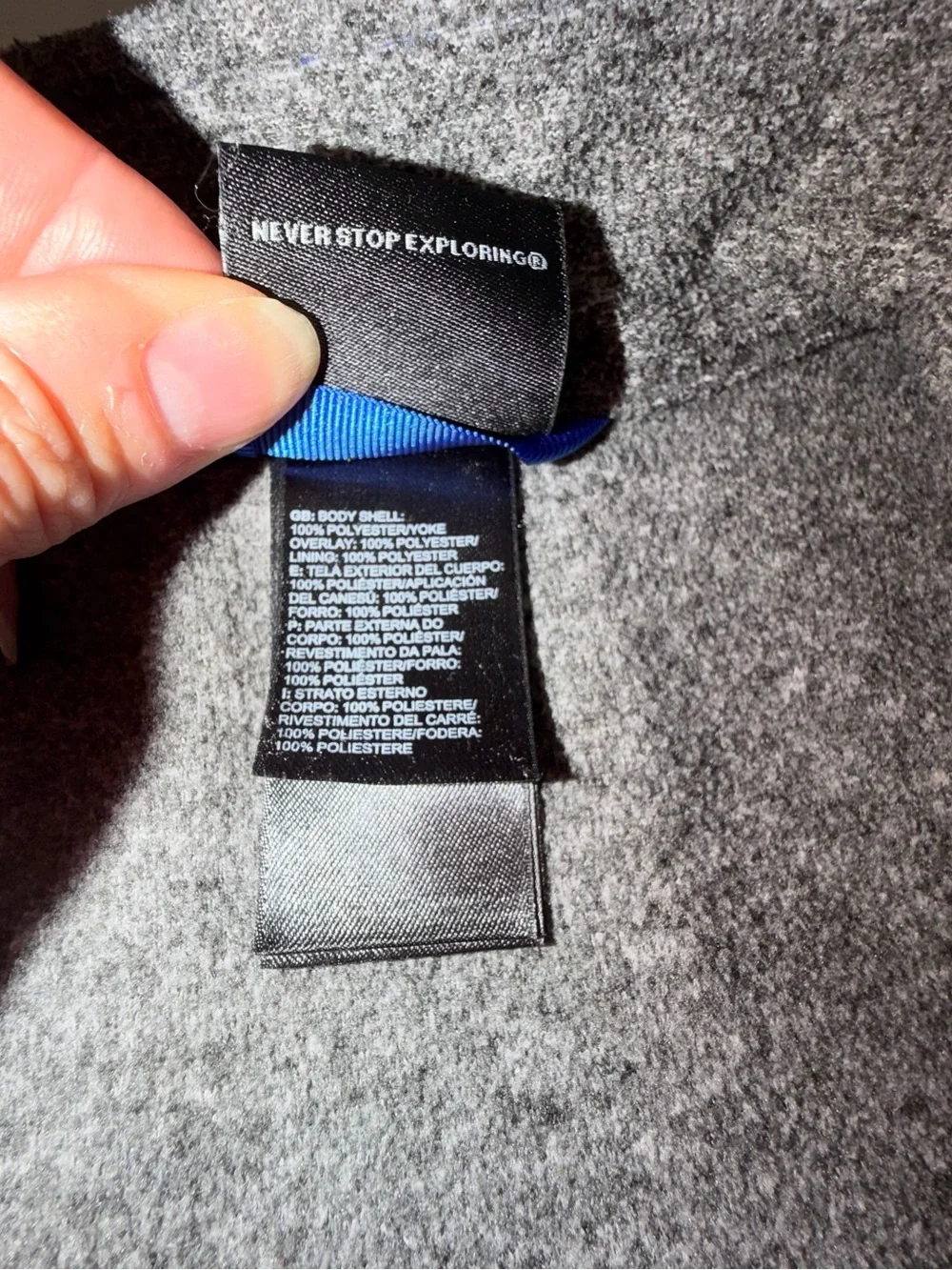 The North Face Kids Black and Gray Jacket with Blue Zip. C13,EMP